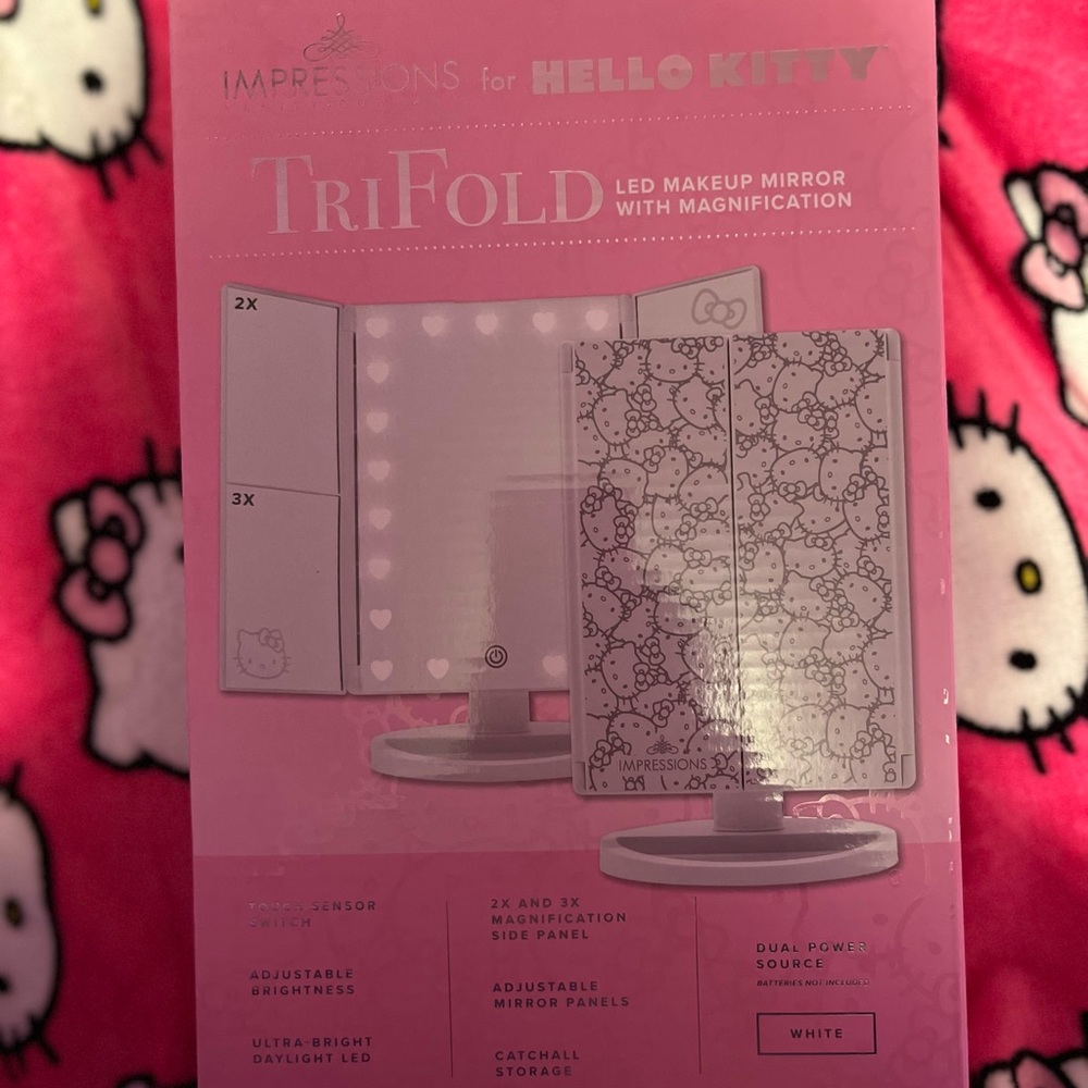 Tri fold LED makeup mirror with magnification
